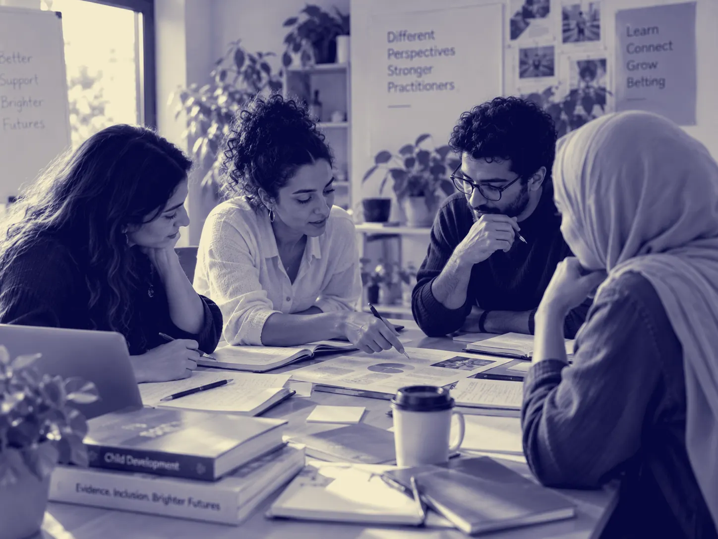 Practitioners collaborating around a shared table