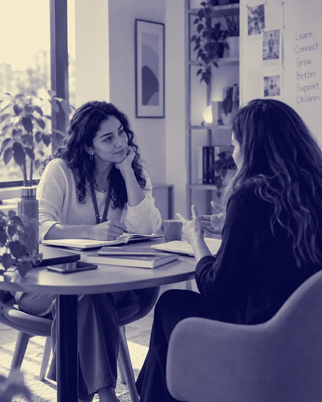 Two practitioners in a one-to-one conversation